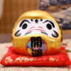 Búp bê Daruma size 14cm màu vàng ánh kim