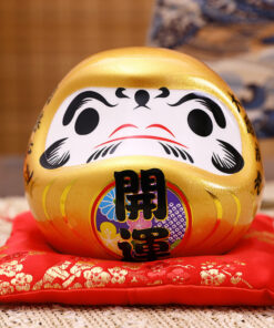 Búp bê Daruma size 14cm màu vàng ánh kim